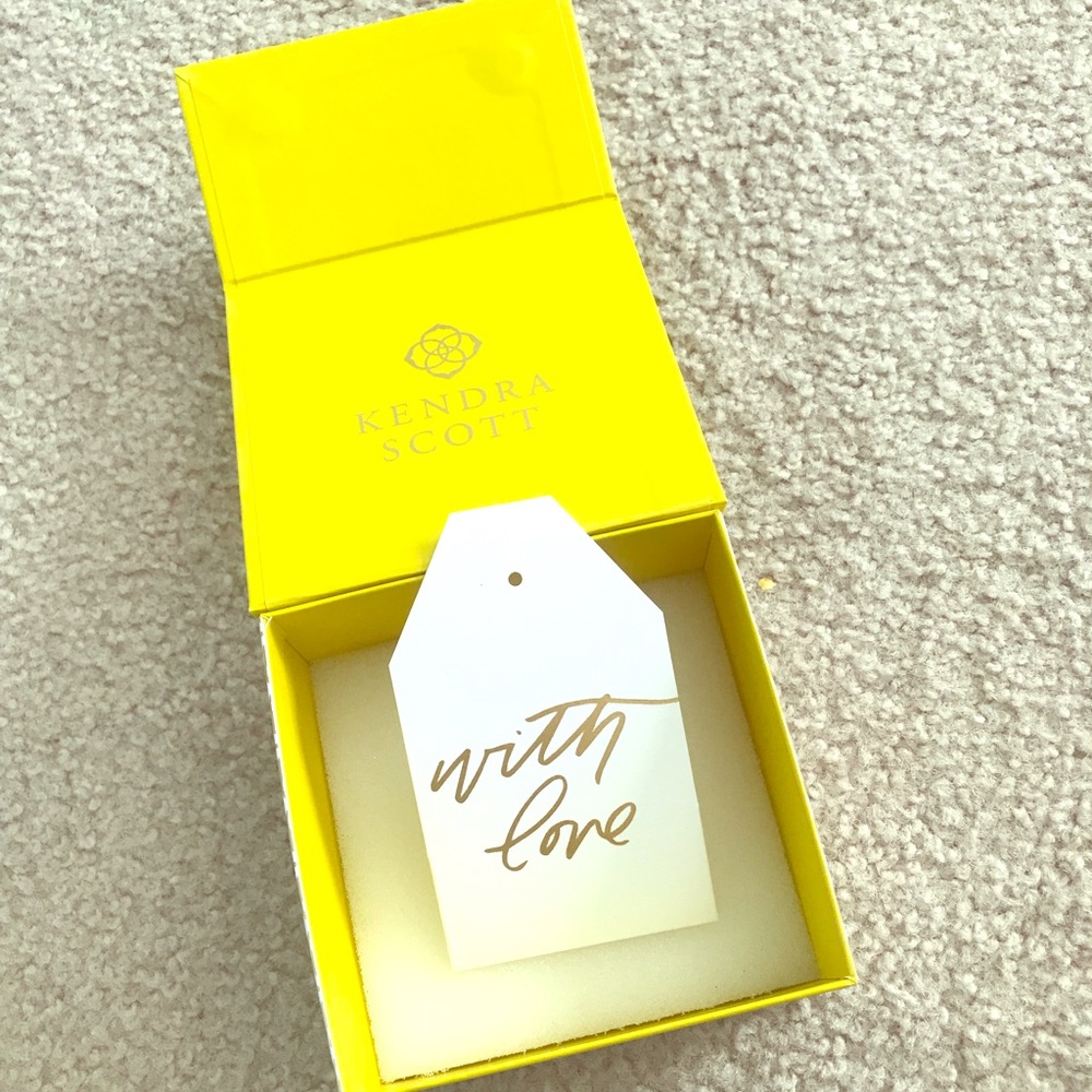 Three Kendra Scott boxes